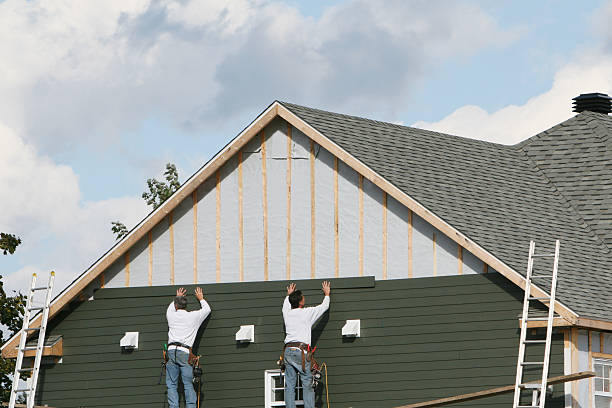 Professional Siding Contractor technician working in Forest Park, IL